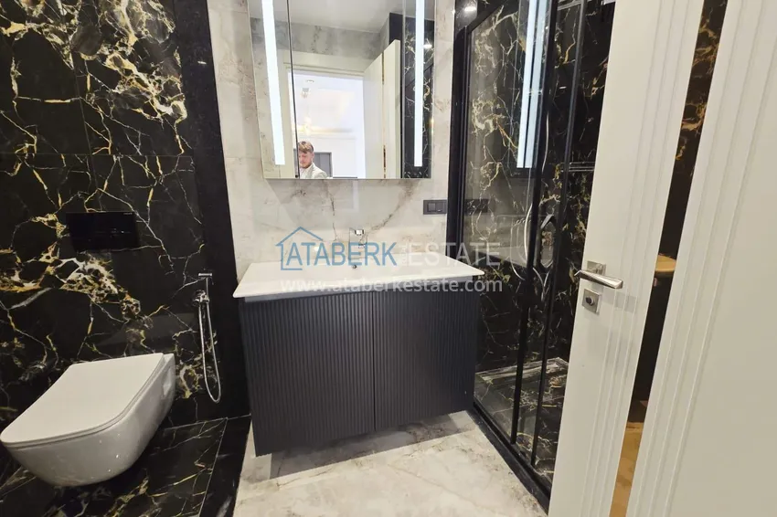 Purchase Spacious 1+1 apartment in Turkler — 80 m2 furnished by the owner, premium resort 15