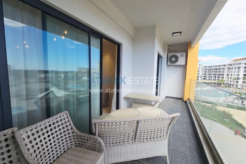 Purchase Spacious 1+1 apartment in Turkler — 80 m2 furnished by the owner, premium resort 16