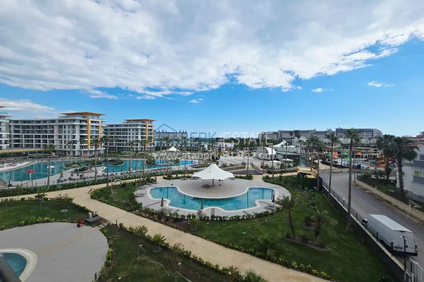 Purchase Spacious 1+1 apartment in Turkler — 80 m2 furnished by the owner, premium resort 18
