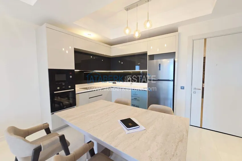 Purchase Spacious 1+1 apartment in Turkler — 80 m2 furnished by the owner, premium resort 5