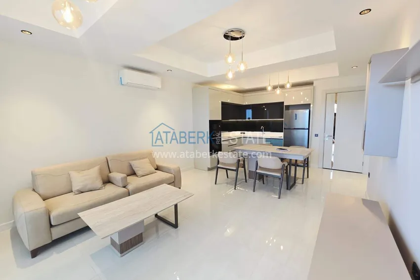 Purchase Spacious 1+1 apartment in Turkler — 80 m2 furnished by the owner, premium resort 9