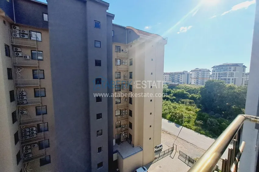 Purchase 2+1 apartment in Avsallar — new furniture, separate kitchen, glazed balcony 17
