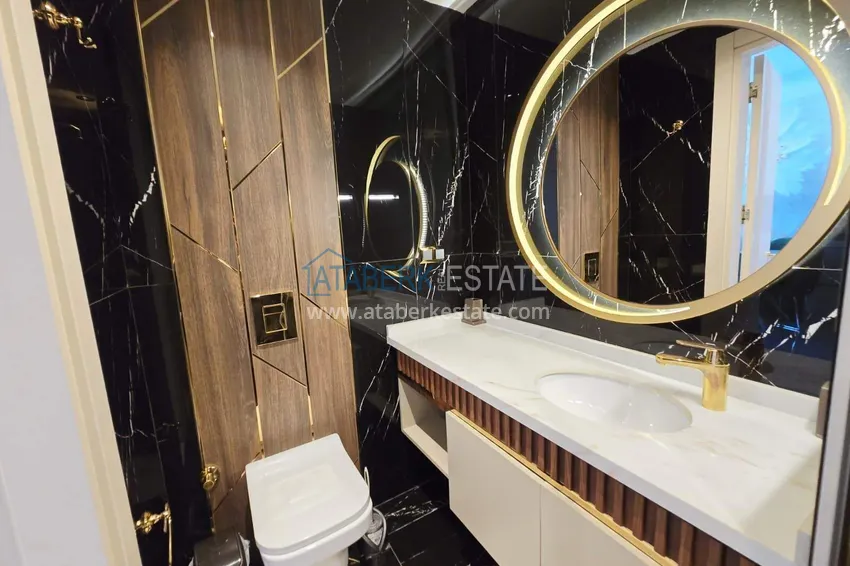 Purchase Stylish 1+1 apartment in the center of Alanya, Keykubat beach area — 150 meters 13