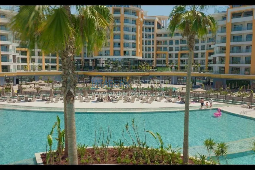 Недвижимость в Алании - квартира 1+1 85 м2 с мебелью в премиальном resort-комплексе, район Тюрклер 15