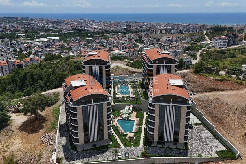 A new stylish investment project at the excavation stage in Oba, Alanya 1 