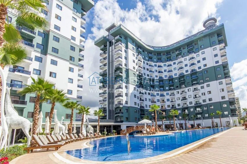 1+1 apartment in Alanya, Mahmutlar district — furniture, mountain view 1