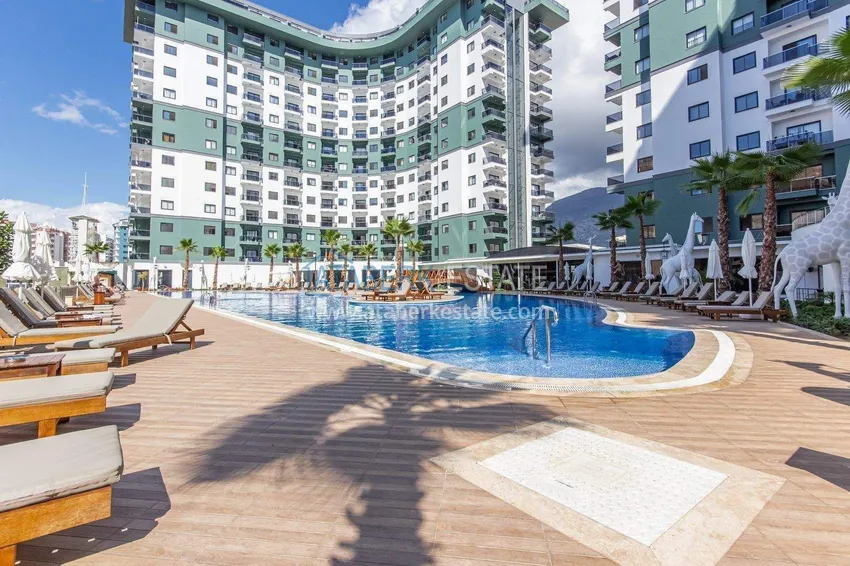 1+1 apartment in Alanya, Mahmutlar district — furniture, mountain view 16