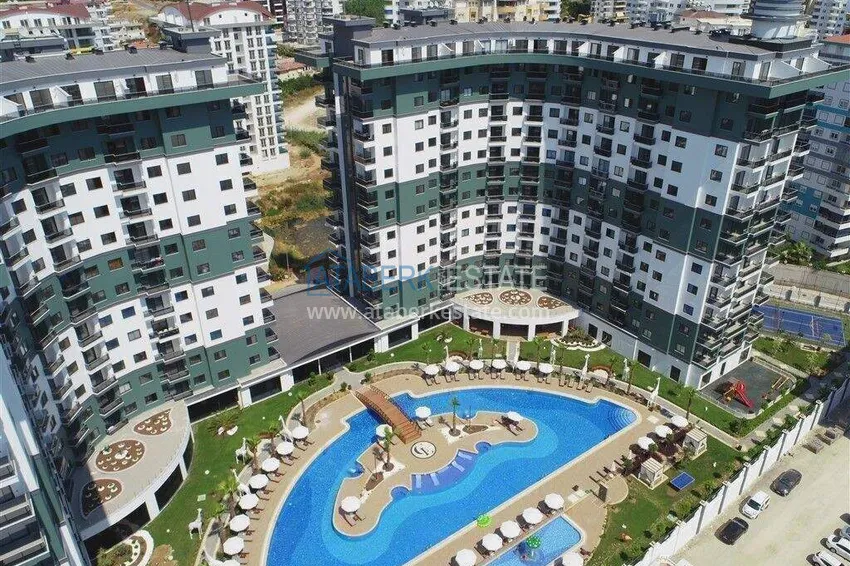 1+1 apartment in Alanya, Mahmutlar district — furniture, mountain view 3