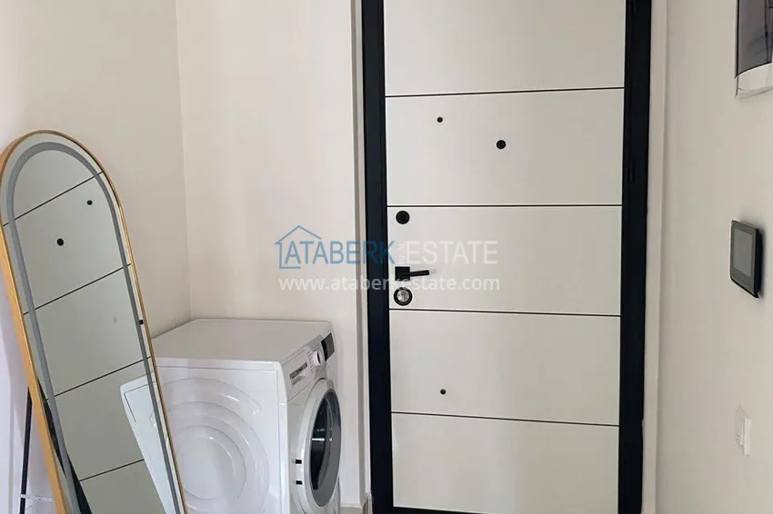 Purchase Rent in Alanya - 2+1 apartment with furniture and sea view in Mahmutlar B45 1 