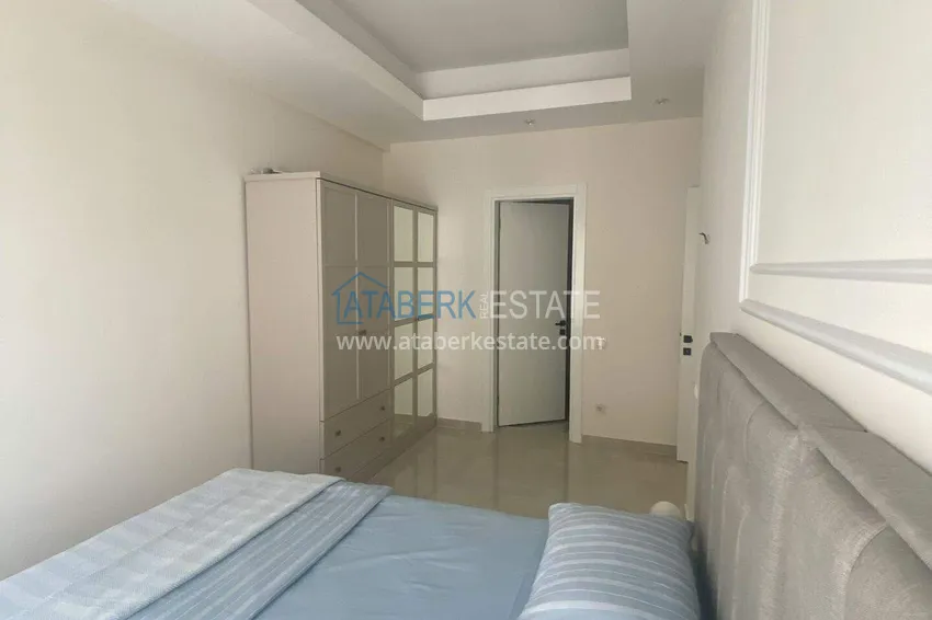 Purchase Rent in Alanya - 2+1 apartment with furniture and sea view in Mahmutlar B45 11 