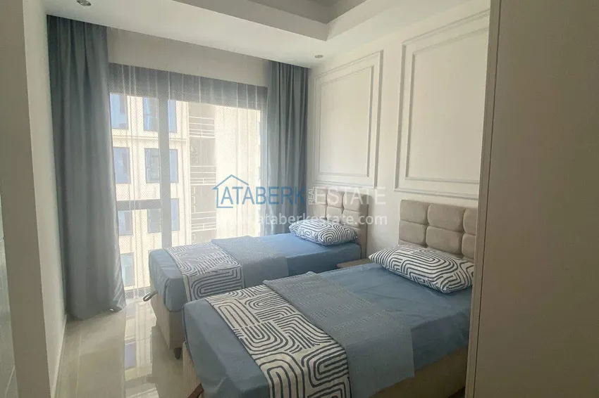 Purchase Rent in Alanya - 2+1 apartment with furniture and sea view in Mahmutlar B45 13 