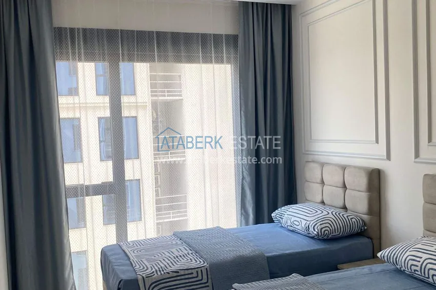 Purchase Rent in Alanya - 2+1 apartment with furniture and sea view in Mahmutlar B45 14 