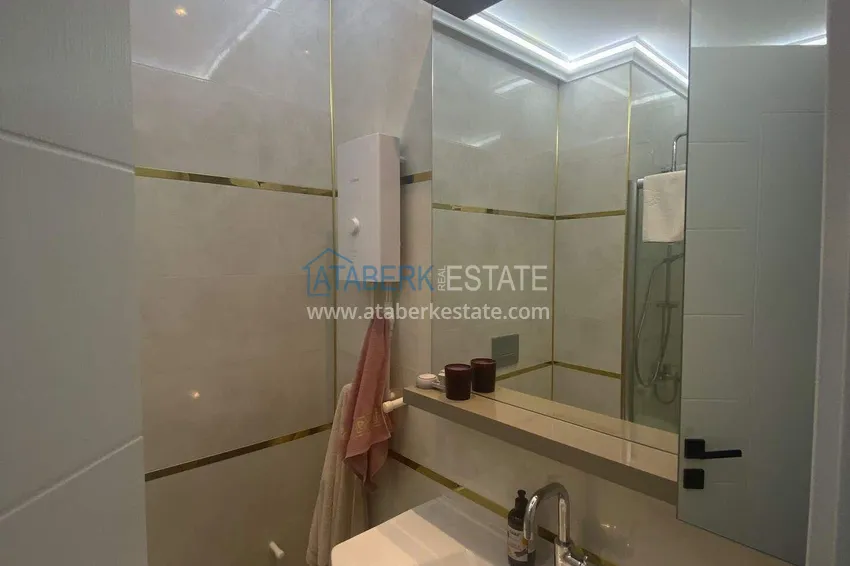 Purchase Rent in Alanya - 2+1 apartment with furniture and sea view in Mahmutlar B45 16 