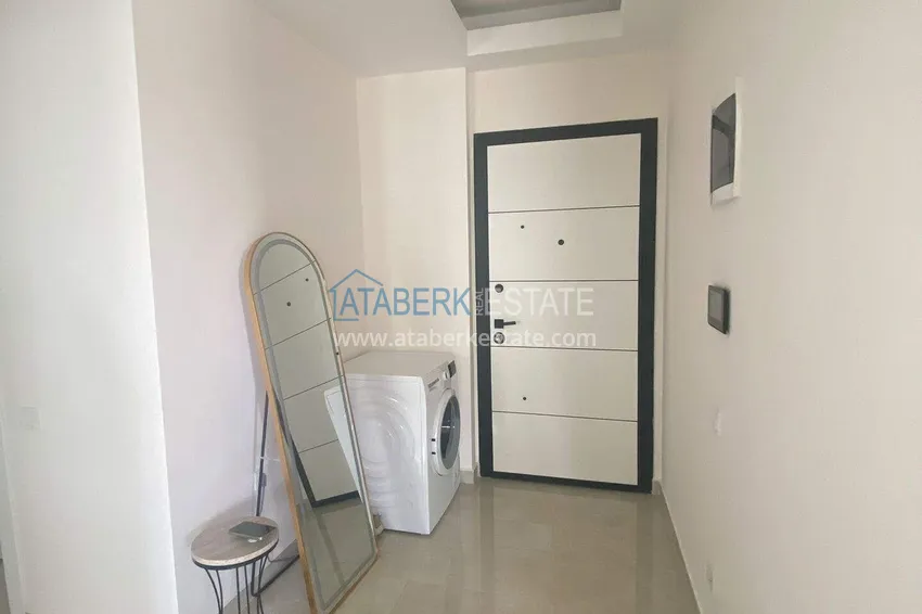 Purchase Rent in Alanya - 2+1 apartment with furniture and sea view in Mahmutlar B45 2 