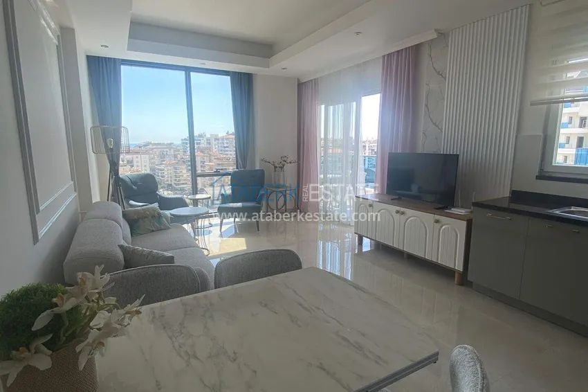 Purchase Rent in Alanya - 2+1 apartment with furniture and sea view in Mahmutlar B45 3 