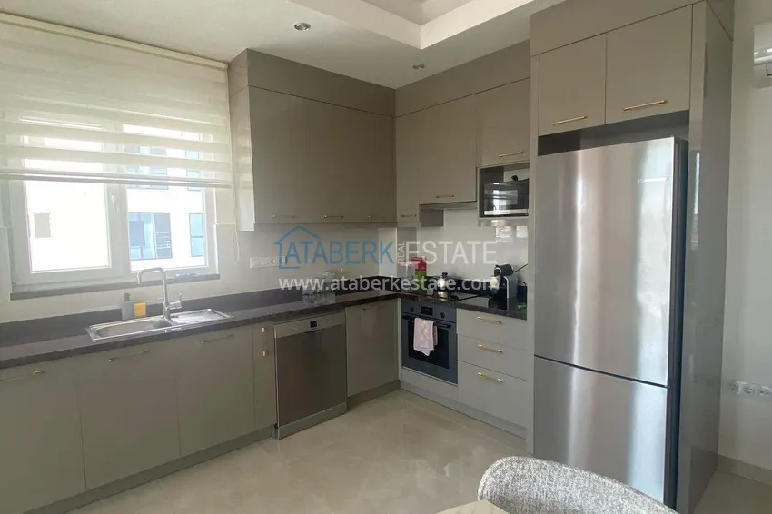 Purchase Rent in Alanya - 2+1 apartment with furniture and sea view in Mahmutlar B45 6 