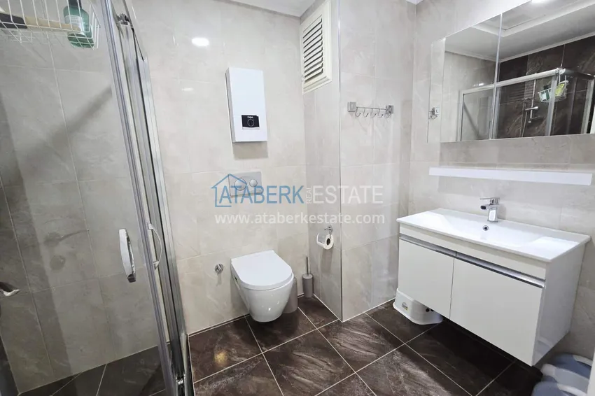 Purchase Furnished 1+1 apartment with partial sea view, Avsallar — Alanya 9