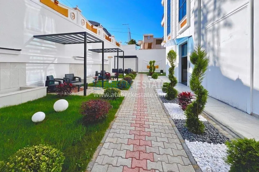 1+1 apartment in Mahmutlar, furnished - a bargain price and a modern residence 13