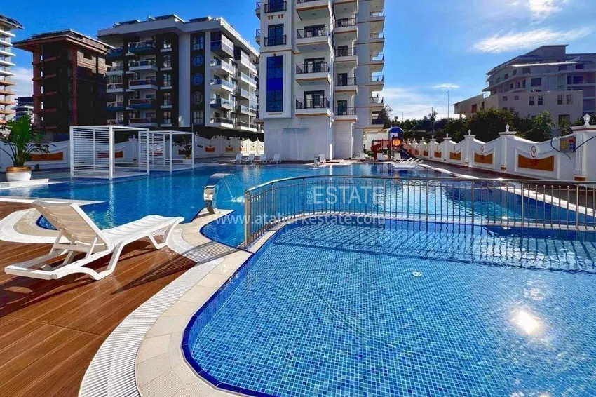1+1 apartment in Mahmutlar, furnished - a bargain price and a modern residence 8