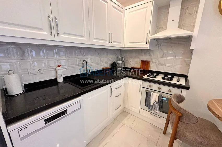 Purchase 1+1 apartment in Mahmutlar, furnished - a bargain price and a modern residence 9