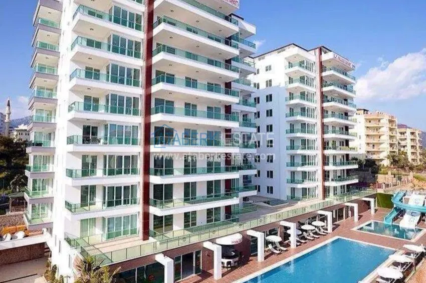 1+1 apartment in Tosmur, 76 m2 with furniture and sea view - property for a residence permit in Alanya 2
