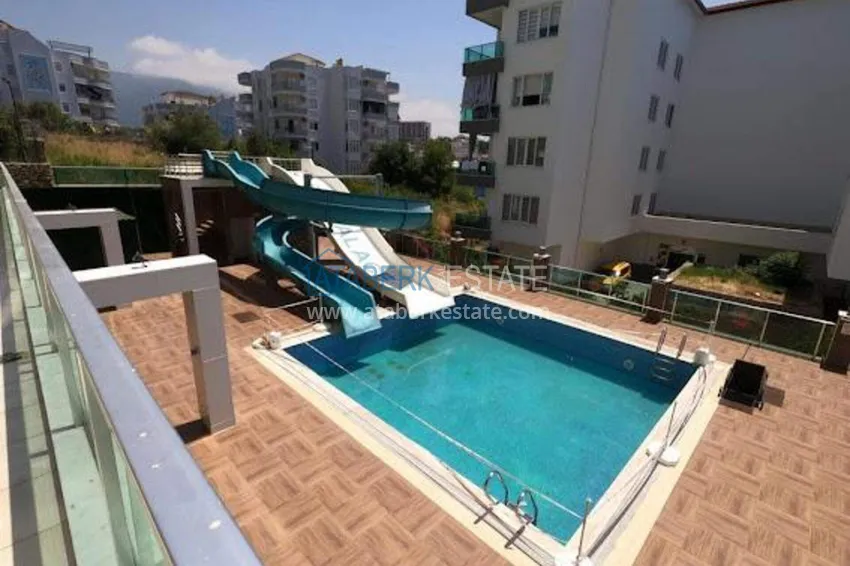 1+1 apartment in Tosmur, 76 m2 with furniture and sea view - property for a residence permit in Alanya 8