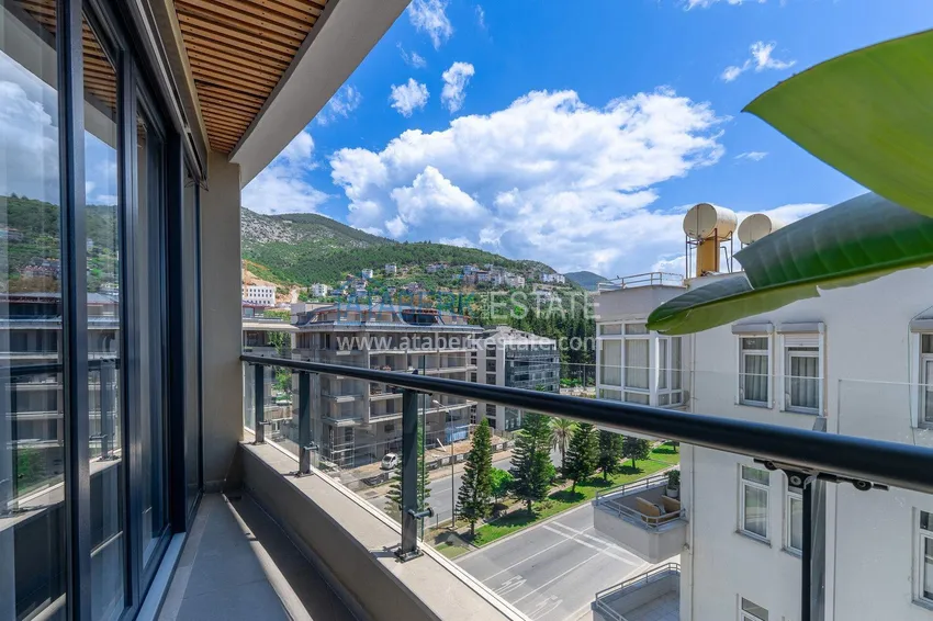 Purchase 1+1 apartment in the center of Alanya — furniture, mountain view, 250 meters from Cleopatra beach 12