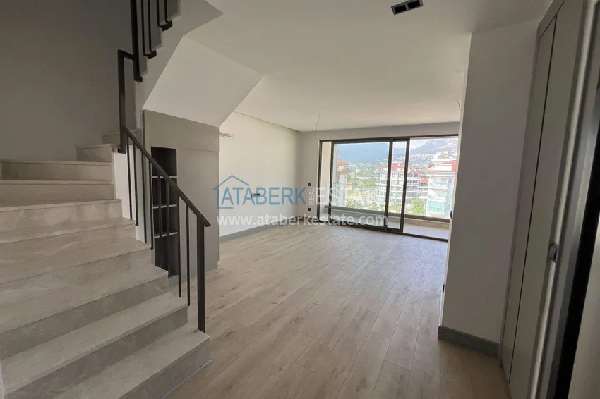 Kupuj Dwupoziomowy penthouse 2+1 przy plaży w Alanya, dzielnica Kestel 21