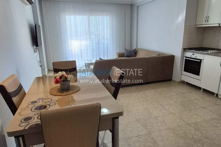 Purchase 2+1 apartment for a residence permit in Alanya, Tosmur district - furniture, mountain and sea views 5 