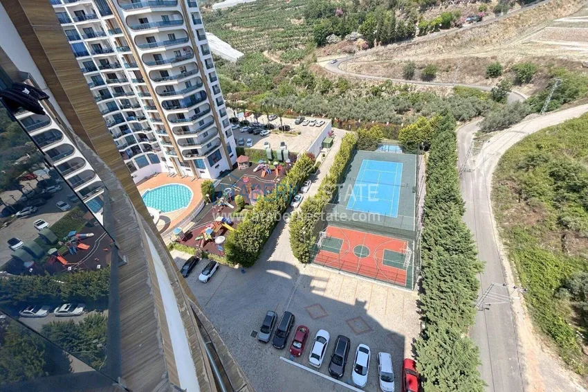 Purchase 3+1 apartment in Alanya, Mahmutlar district — linear with furniture and panoramic views of the sea and mountains 14 