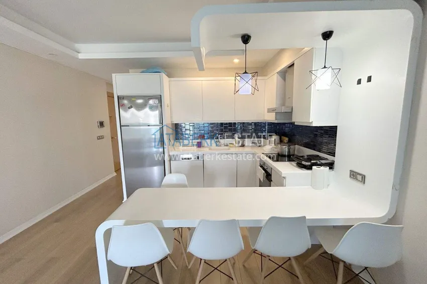 Purchase 3+1 apartment in Alanya, Mahmutlar district — linear with furniture and panoramic views of the sea and mountains 5 