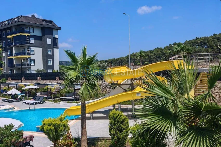 Apartament pod klucz z 1 sypialnią i przeszklonym balkonem w Alanya w dzielnicy Avsallar. Dostępna jest rata 12