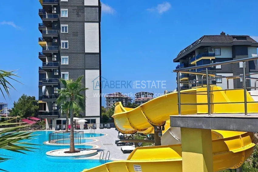 Apartament pod klucz z 1 sypialnią i przeszklonym balkonem w Alanya w dzielnicy Avsallar. Dostępna jest rata 13