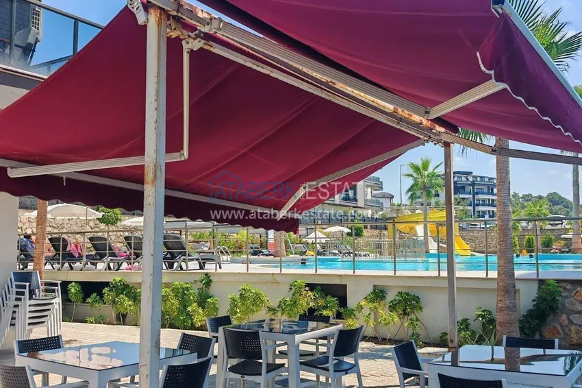 Apartament pod klucz z 1 sypialnią i przeszklonym balkonem w Alanya w dzielnicy Avsallar. Dostępna jest rata 15