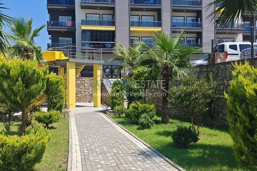 Apartament pod klucz z 1 sypialnią i przeszklonym balkonem w Alanya w dzielnicy Avsallar. Dostępna jest rata 17