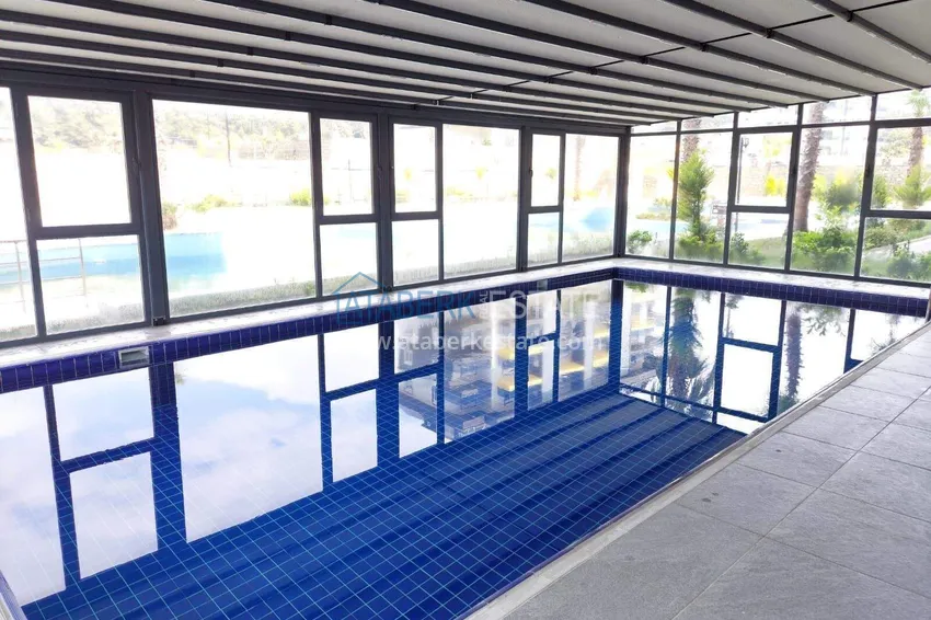 Apartament pod klucz z 1 sypialnią i przeszklonym balkonem w Alanya w dzielnicy Avsallar. Dostępna jest rata 30