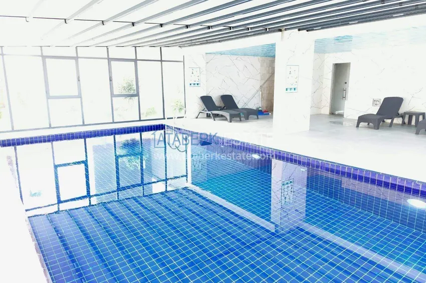 Apartament pod klucz z 1 sypialnią i przeszklonym balkonem w Alanya w dzielnicy Avsallar. Dostępna jest rata 31