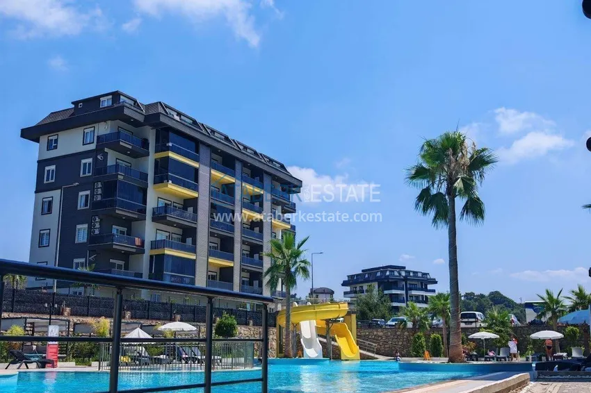 Apartament pod klucz z 1 sypialnią i przeszklonym balkonem w Alanya w dzielnicy Avsallar. Dostępna jest rata 10