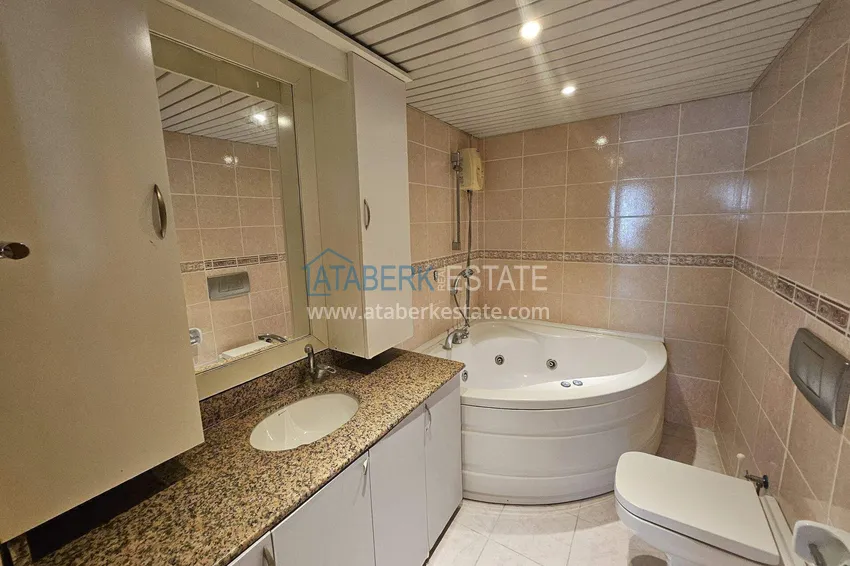 Purchase 3+1 single-level apartment in Alanya - the first coastal area of Tosmur 17 